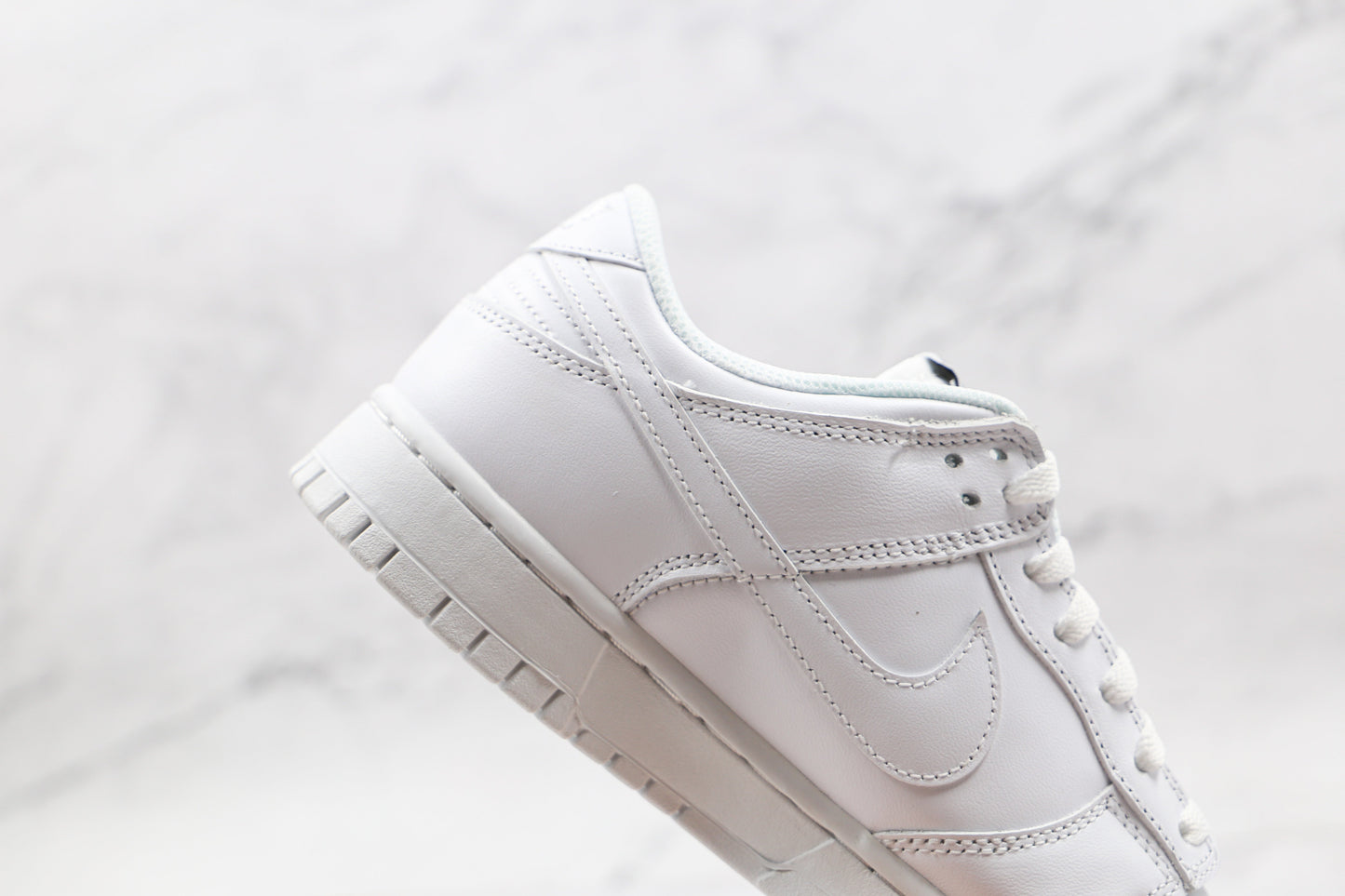 Dunk Low “Triple White”