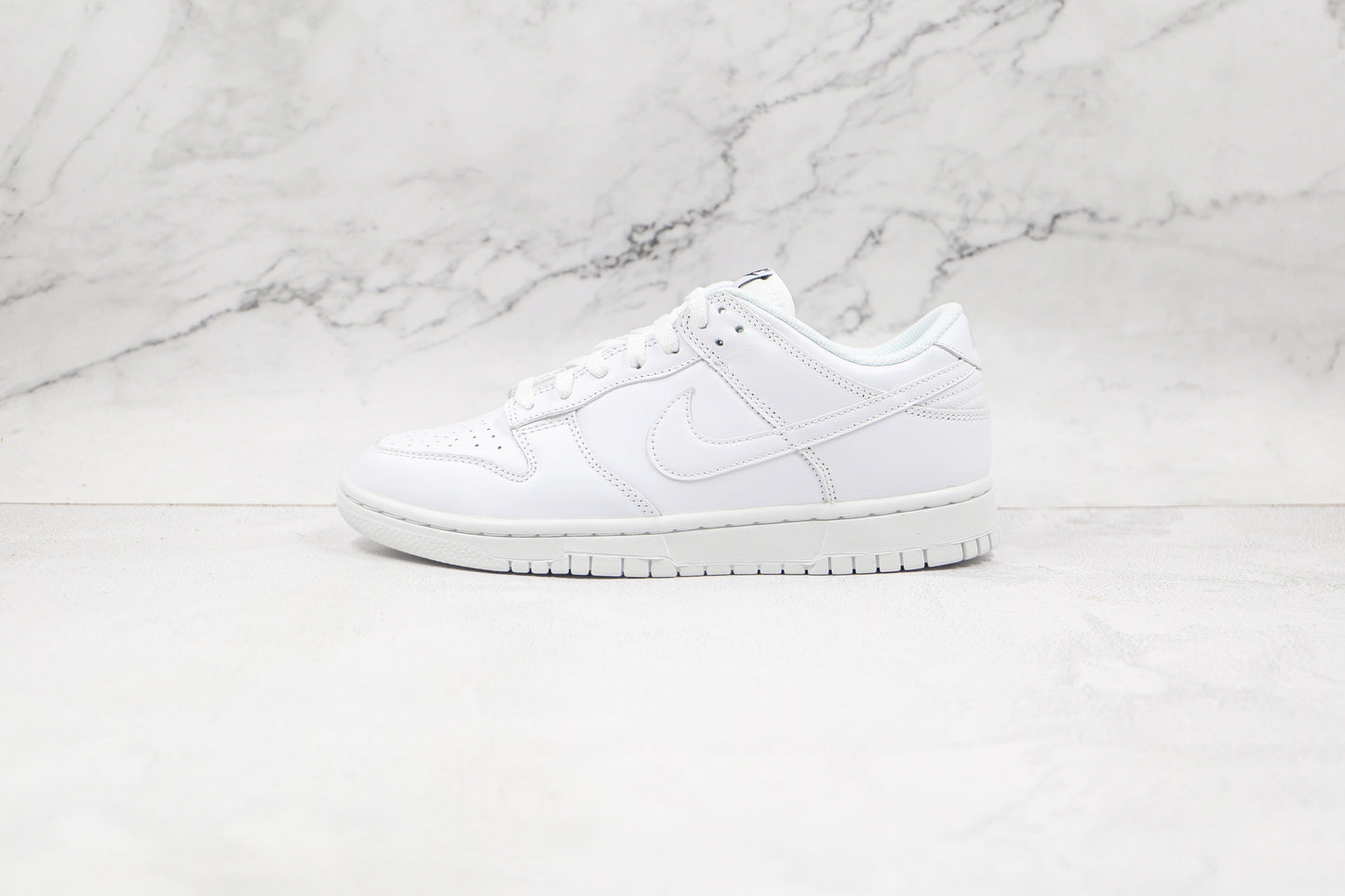 Dunk Low “Triple White”