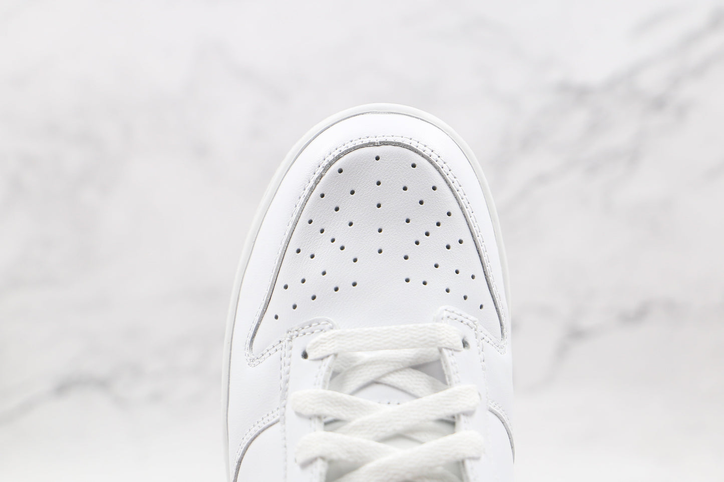 Dunk Low “Triple White”